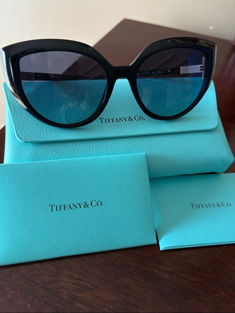 Tiffany & Co. Black Cat-Eye Sunglasses with Blue Gradient Lenses